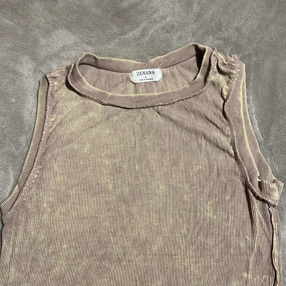 Distressed tank top .